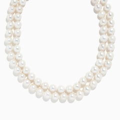 A close-up of a 925 Sterling Silver Freshwater Pearl Necklace, shown against a plain white background.