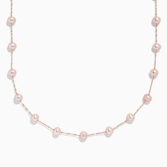 The 14K Rose Gold Cultured Fresh Water Pearl Necklace features delicate, evenly spaced pearls and is displayed against a plain white background.