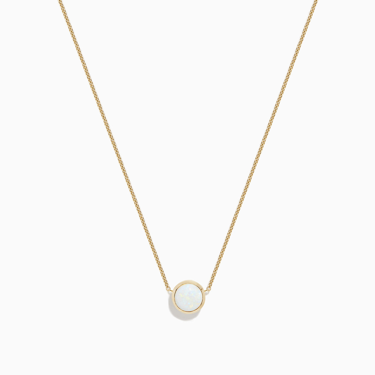 The Aurora 14K Yellow Gold Bezel Set Opal Necklace (0.55 TCW) features a round white opal pendant on a delicate gold chain—an elegant piece from the Effy Aurora collection.