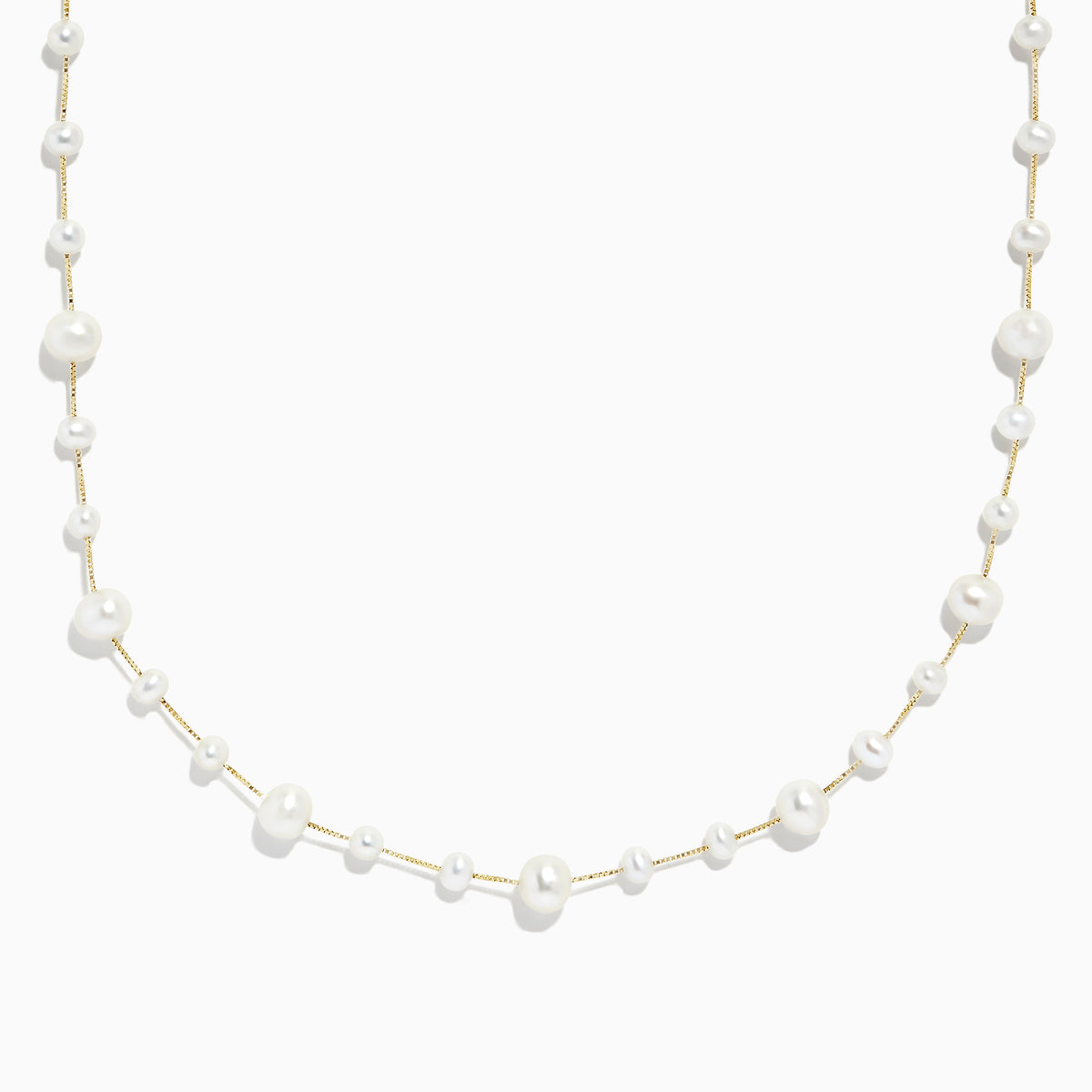 The 14K Yellow Gold Cultured Fresh Water Pearl Necklace by Effy features spaced irregular pearls on a delicate gold chain, shown on a white background.