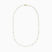 The 14K Yellow Gold Cultured Fresh Water Pearl Necklace features small freshwater pearls and gold accents, evenly arranged along a fine 14K gold chain with a polished gold clasp.