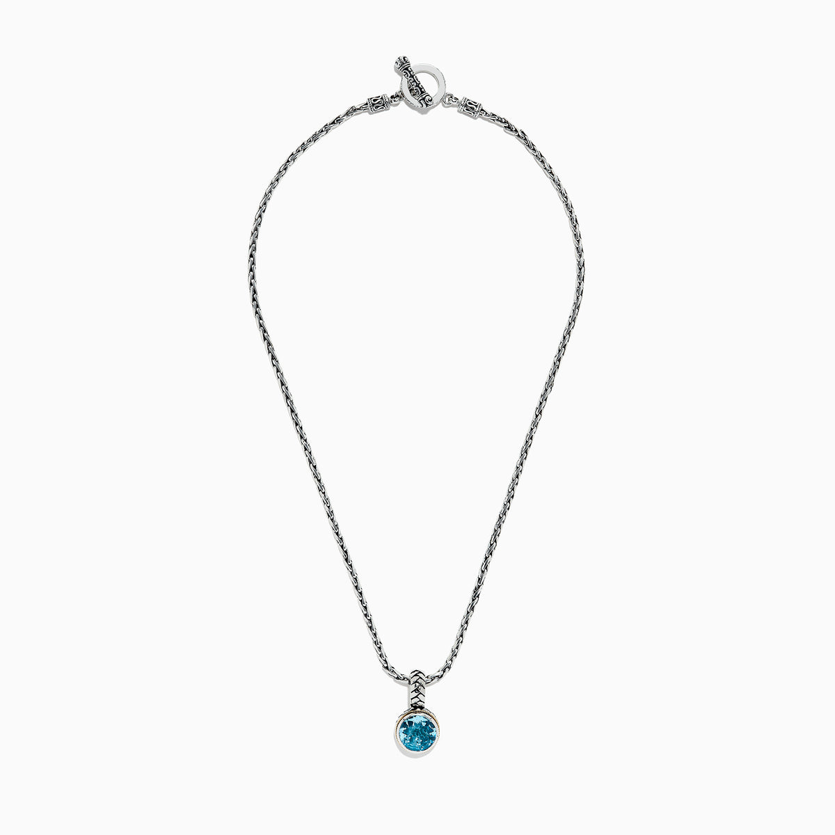 A 925 sterling silver necklace with an 18K gold-accented, round blue topaz pendant (7.36 TCW) is displayed on a white background.