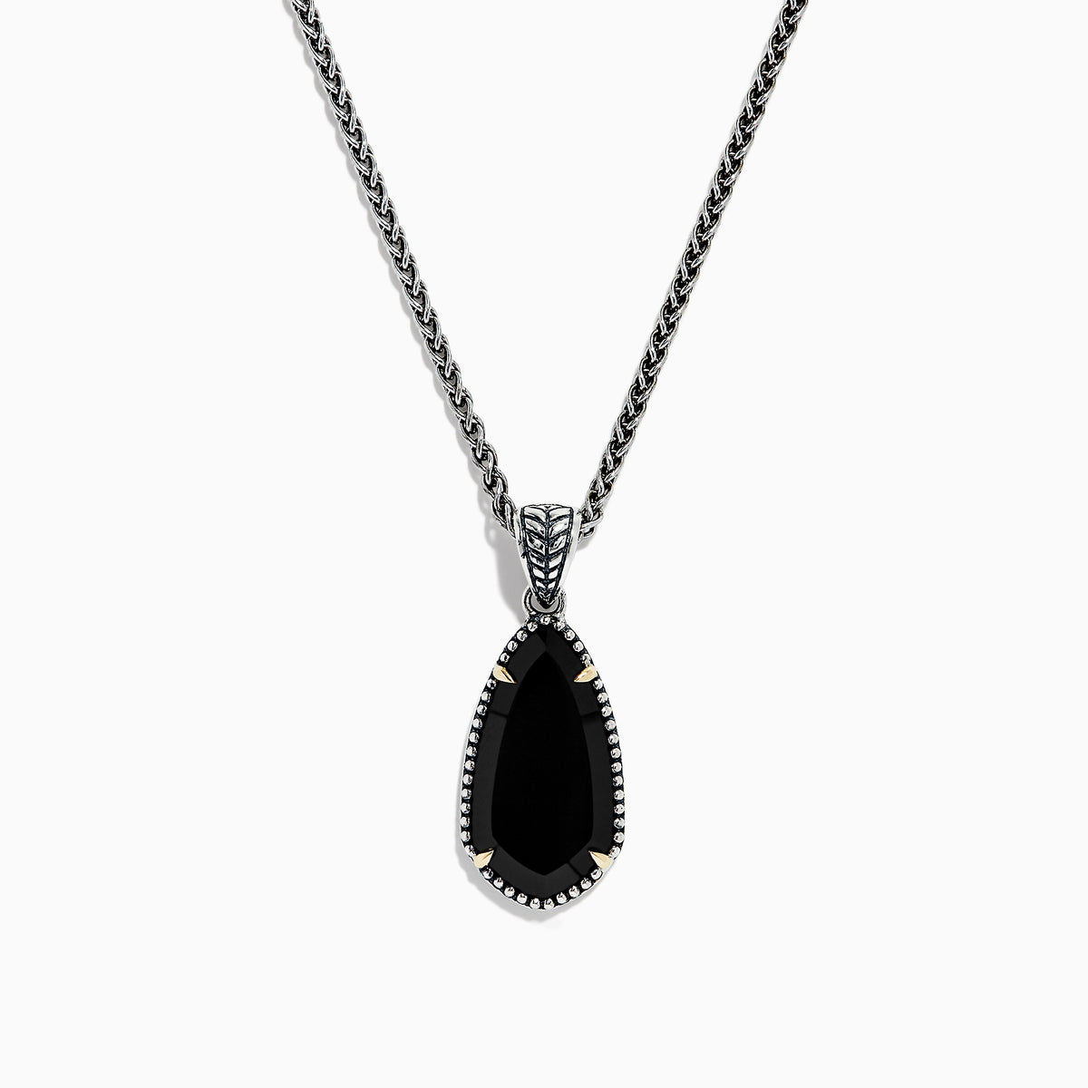 The Eclipse 925 Sterling Silver Onyx Pendant (4.56 TCW) showcases a large, teardrop-shaped onyx in a decorative bezel setting on a sterling silver chain, set against a white background.