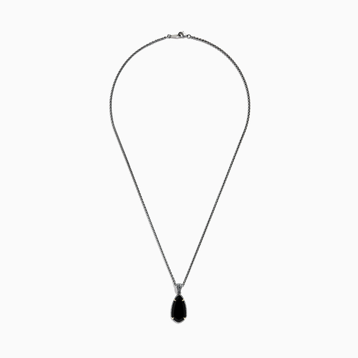 The Eclipse 925 Sterling Silver Onyx Pendant (4.56 TCW) showcases a large, teardrop-shaped onyx in a decorative bezel setting on a sterling silver chain, set against a white background.