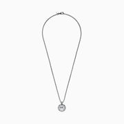 The Mens Sterling Silver Compass Pendant features a silver chain, a round pendant with a raised star, and engraved cardinal directions (N, E, S, W)—a bold accessory for any style.
