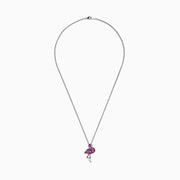 The Safari Sterling Silver Pink Sapphire and Amethyst Flamingo Pendant (1.88 TCW) features a flamingo standing elegantly on one leg, adorned with pink sapphire and amethyst gemstones.