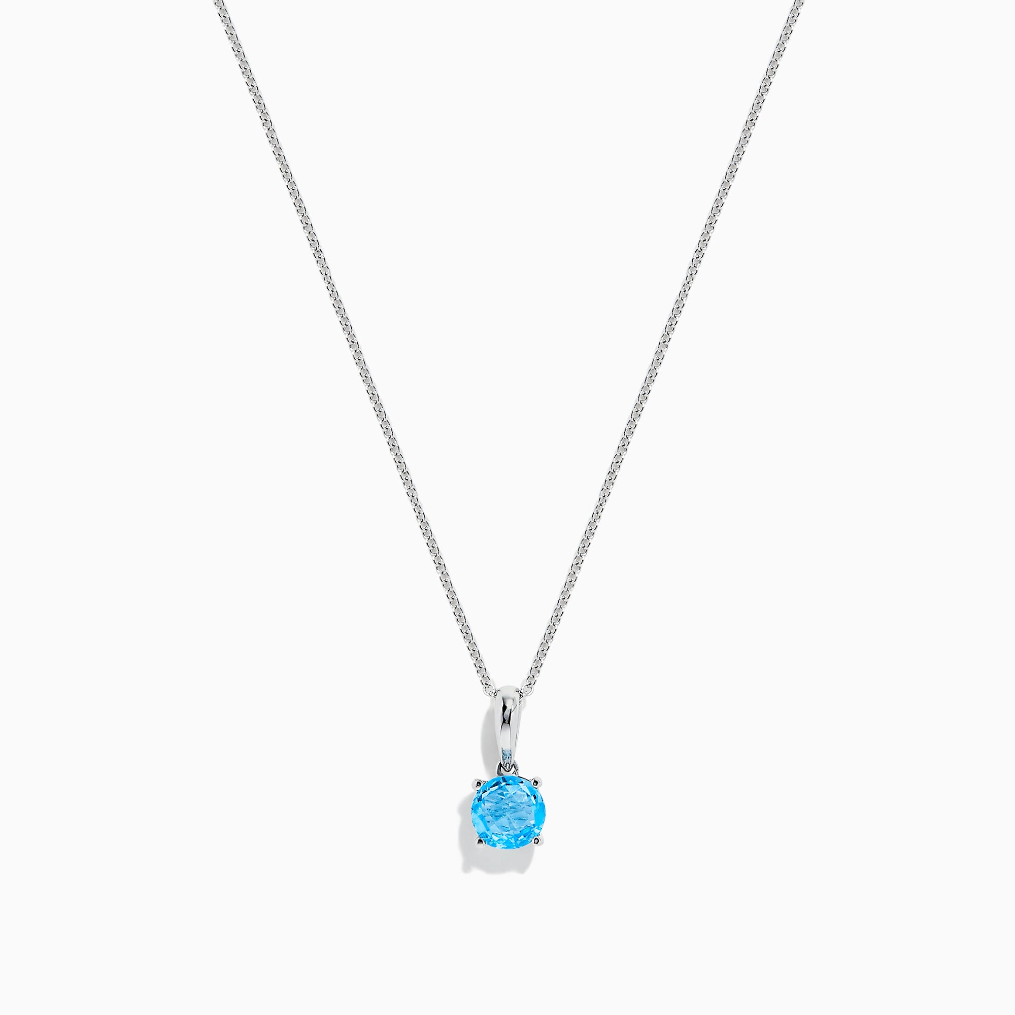 The Ocean Bleu 14K White Gold Blue Topaz Pendant, 1.00 TCW, features a single round blue topaz on a delicate white gold chain, showcased against a plain white background.