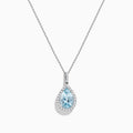 The Aquarius 14K White Gold Aquamarine and Diamond Pendant showcases a teardrop aquamarine framed by sparkling diamonds, elegantly displayed on a plain white background.