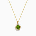 The 14K Yellow Gold Peridot and Diamond Pendant features a round peridot accented by sparkling diamonds, all set in yellow gold for a radiant look.