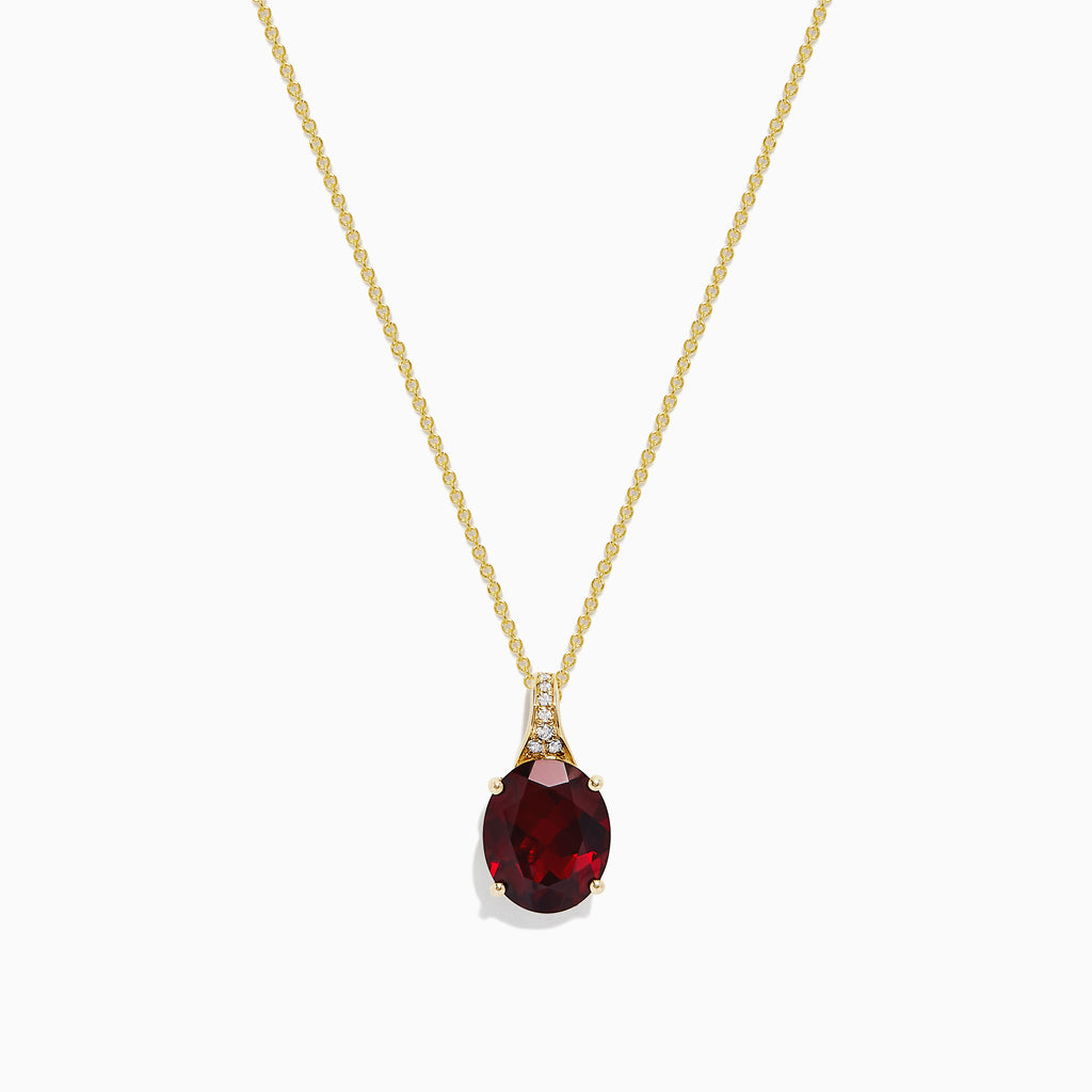 The Bordeaux 14K Yellow Gold Garnet and Diamond Pendant (4.68 TCW) features a fine chain and a striking oval deep red garnet accented by sparkling diamonds above the stone.