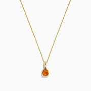 The Sunset 14K Yellow Gold Citrine Pendant (0.81 TCW) features a delicate yellow gold chain and a small round citrine in a simple gold setting, shown on a white background.