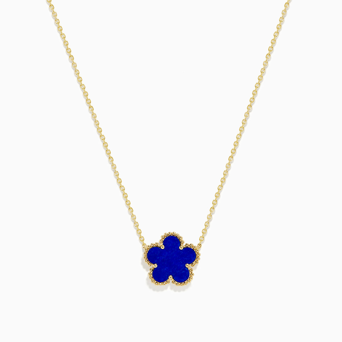 The Novelty 14K Yellow Gold Lapis Flower Necklace features a blue four-leaf clover-shaped pendant with a textured gold border, inspired by Effys signature design.