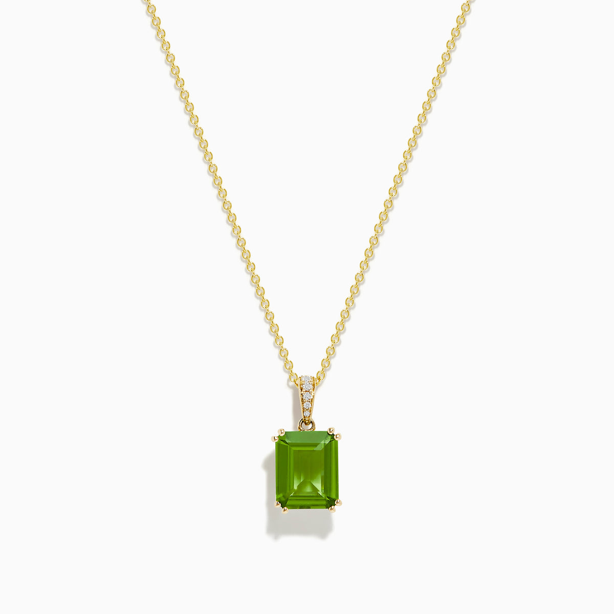 The 14K Yellow Gold Peridot and Diamond Pendant features a square-cut peridot gemstone and sparkling diamonds, set in yellow gold and shown against a white background.