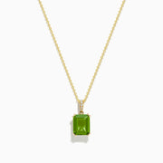 The 14K Yellow Gold Peridot and Diamond Pendant features a square-cut peridot gemstone and sparkling diamonds, set in yellow gold and shown against a white background.