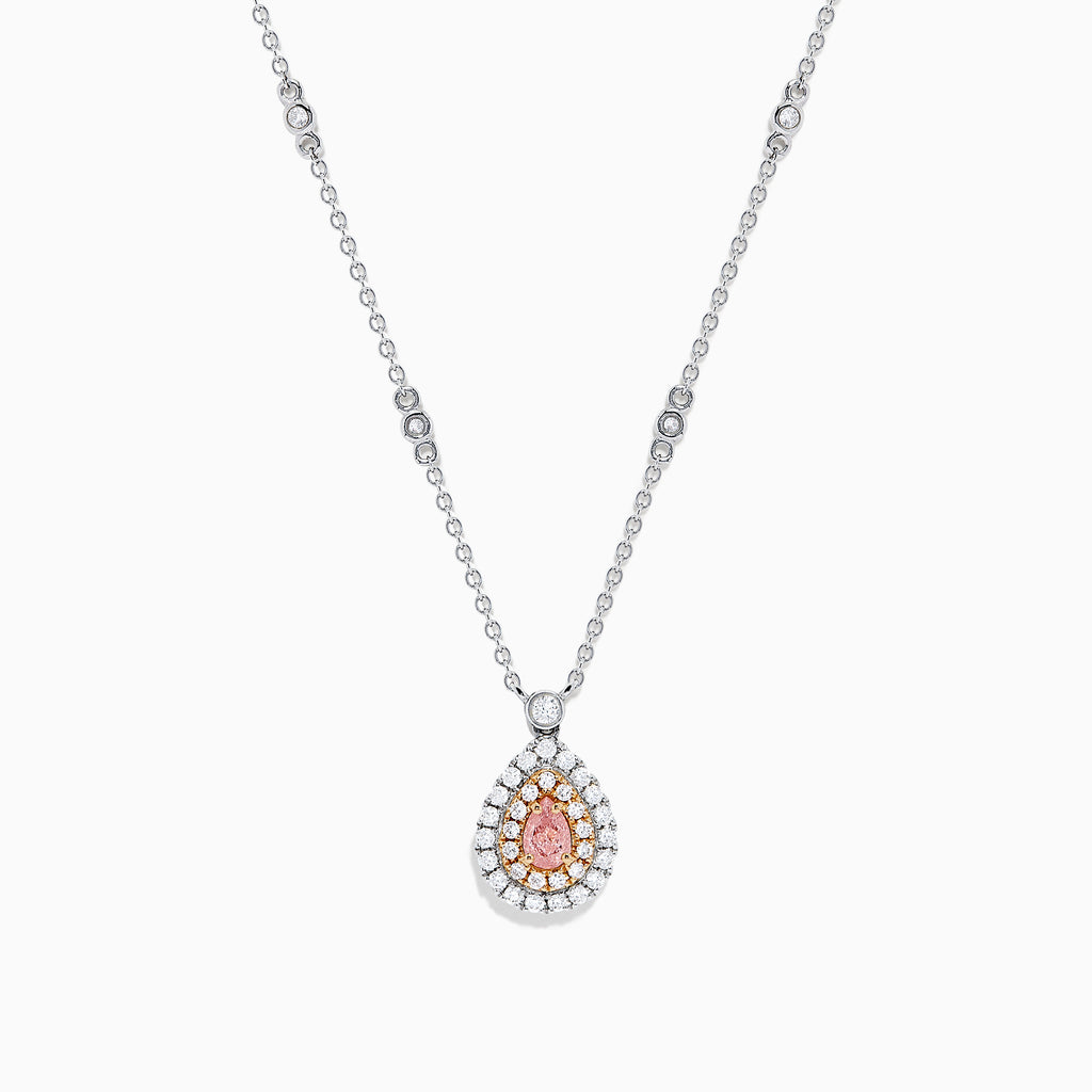 Elegant 18K gold necklace featuring a pinkish-brown certified diamond center, two rows of clear stones, and decorative chain links. Total carat weight: 0.70 TCW.
