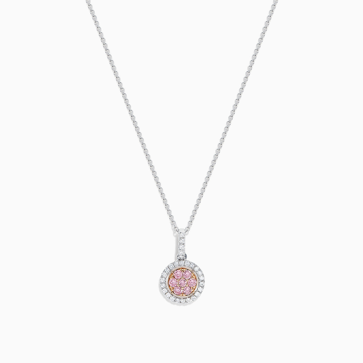 The 18K Two Tone Gold Pink and White Diamond Pendant features a circular design with a 0.42 TCW center cluster of pink diamonds, encircled by white diamonds, on a delicate chain for an elegant look.