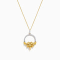The 14K Yellow Gold Yellow and White Diamond Pendant (1.75 TCW) features a thin chain and a diamond-studded circular pendant with textured gold leaves forming a floral cluster for an elegant, intricate look.