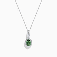 A 14K white gold pendant featuring a round green Tanzanite and diamonds (2.35 TCW) on a delicate chain, displayed on a white background.