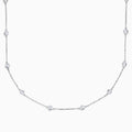 The 14K White Gold 18 Diamond Station Necklace boasts 1.50 TCW of round diamonds in bezel settings on a fine chain, shown against a white background.