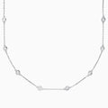 The 14K White Gold 18 Diamond Station Necklace features evenly spaced bezel-set round diamonds totaling 2.00 TCW, offering a simple, elegant, and minimalist design for timeless sophistication.