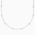 The 14K White Gold 18 Diamond Station Necklace showcases evenly spaced round bezel-set diamonds totaling 1.00 TCW, elegantly displayed against a white background.