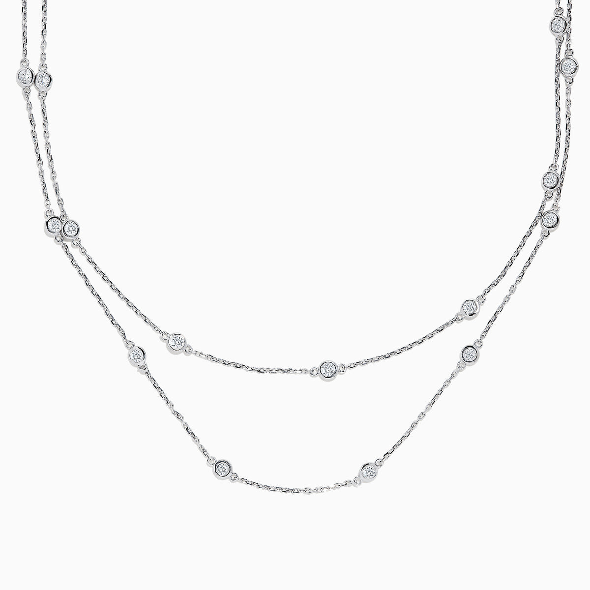 The 14K White Gold 36 Diamond Station Necklace features evenly spaced bezel-set round diamonds totaling 2.00 TCW along double-layered chains, shown on a plain white background.