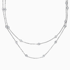 The 14K White Gold 36 Diamond Station Necklace features evenly spaced bezel-set round diamonds totaling 2.00 TCW along double-layered chains, shown on a plain white background.