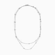 The 14K White Gold 36 Diamond Station Necklace features evenly spaced bezel-set round diamonds totaling 2.00 TCW along double-layered chains, shown on a plain white background.