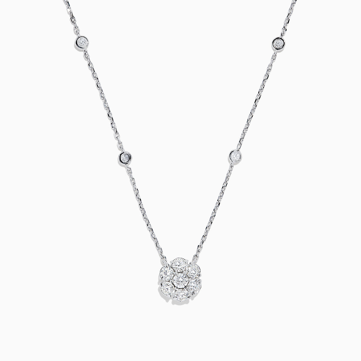 The 14K White Gold 18 Diamond Station and Flower Cluster Necklace (1.51 TCW) features a delicate flower cluster pendant and sparkling round diamonds along the chain, shown on a white background.