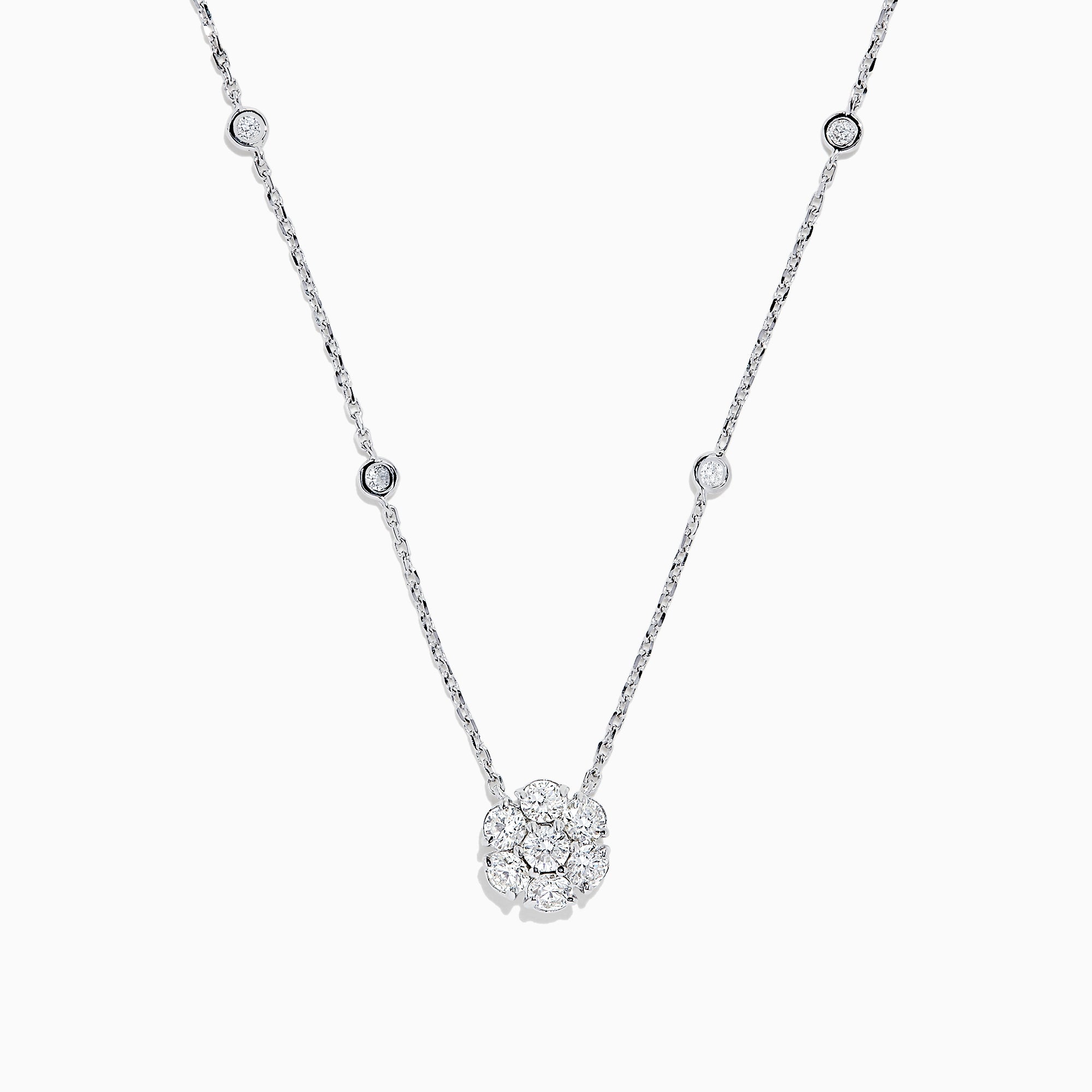 The 14K White Gold 18 Diamond Station and Flower Cluster Necklace (1.51 TCW) features a delicate flower cluster pendant and sparkling round diamonds along the chain, shown on a white background.