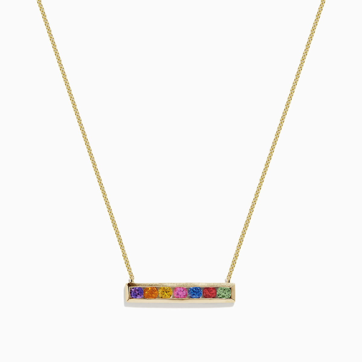 The Watercolors 14K Yellow Gold Multi Sapphire Bar Necklace, 0.93 TCW, features a delicate gold bar with six rainbow-arranged sapphires set in a horizontal rectangular pendant.