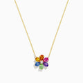The Watercolors 14K Gold Multi Sapphire and Diamond Flower Necklace features a gold chain and a diamond flower pendant accented with eight colorful, teardrop-shaped sapphires arranged in a circle.