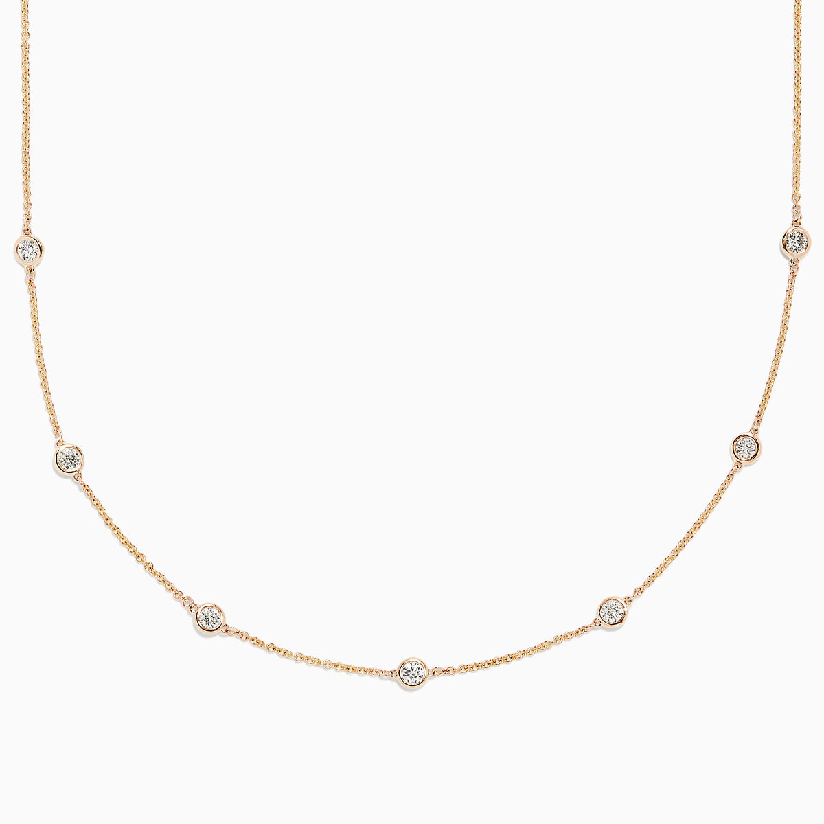 The DOro 14K Yellow Gold Diamond Station Necklace, 0.69 TCW, features a fine gold chain with evenly spaced bezel-set round diamonds for a delicate and elegant look.