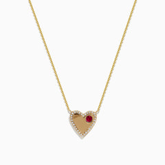 The Novelty 14K Yellow Gold Ruby and Diamond Heart Necklace, 0.29 TCW, showcases a heart-shaped pendant outlined with sparkling diamonds and accented by a single ruby on one side.