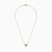 The Novelty 14K Yellow Gold Ruby and Diamond Heart Necklace, 0.29 TCW, showcases a heart-shaped pendant outlined with sparkling diamonds and accented by a single ruby on one side.