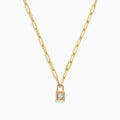 The Novelty 14K Yellow Gold Diamond Mini Lock Necklace features elongated links and a small gold padlock pendant with a central round diamond, displayed on a white background.