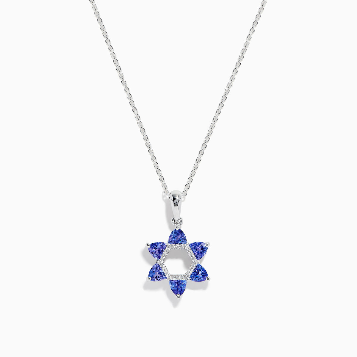 The Nahla Siri 14k Gold Star of David Pendant features tanzanite and diamond accents, displayed on a white background.