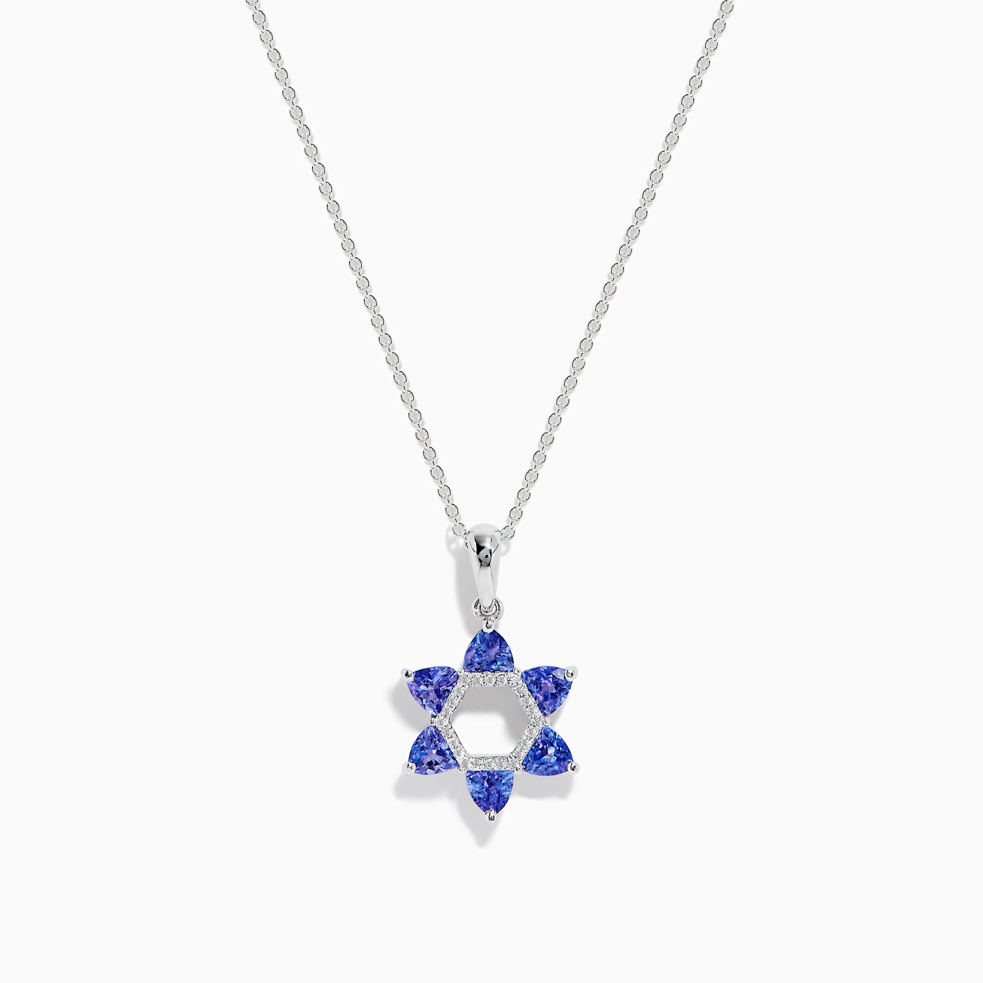 The Nahla Siri 14k Gold Star of David Pendant features tanzanite and diamond accents, displayed on a white background.