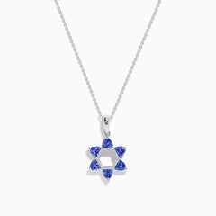 The Nahla Siri 14k Gold Star of David Pendant features tanzanite and diamond accents, displayed on a white background.
