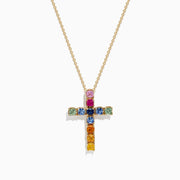 The Watercolors 14K Yellow Gold Multi Sapphire Cross Pendant, 2.05 TCW, showcases vibrant square sapphires in pink, blue, green, orange, and yellow on a stunning yellow gold chain necklace.