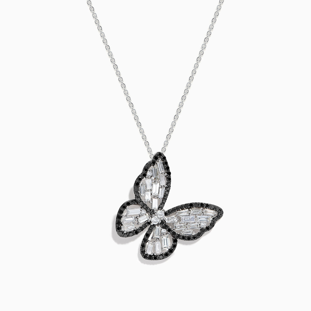 The Nature 14K White Gold Black and White Diamond Butterfly Pendant dazzles with textured wings outlined in black stones, set on a sleek white gold chain for an elegant look.