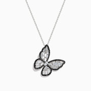 The Nature 14K White Gold Black and White Diamond Butterfly Pendant dazzles with textured wings outlined in black stones, set on a sleek white gold chain for an elegant look.