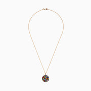 The Watercolors 14K Yellow Gold Multi Sapphire Circle Pendant (5.09 TCW) features a cluster of brightly colored sapphires in various shapes and sizes set in a circle, showcased against a white background.
