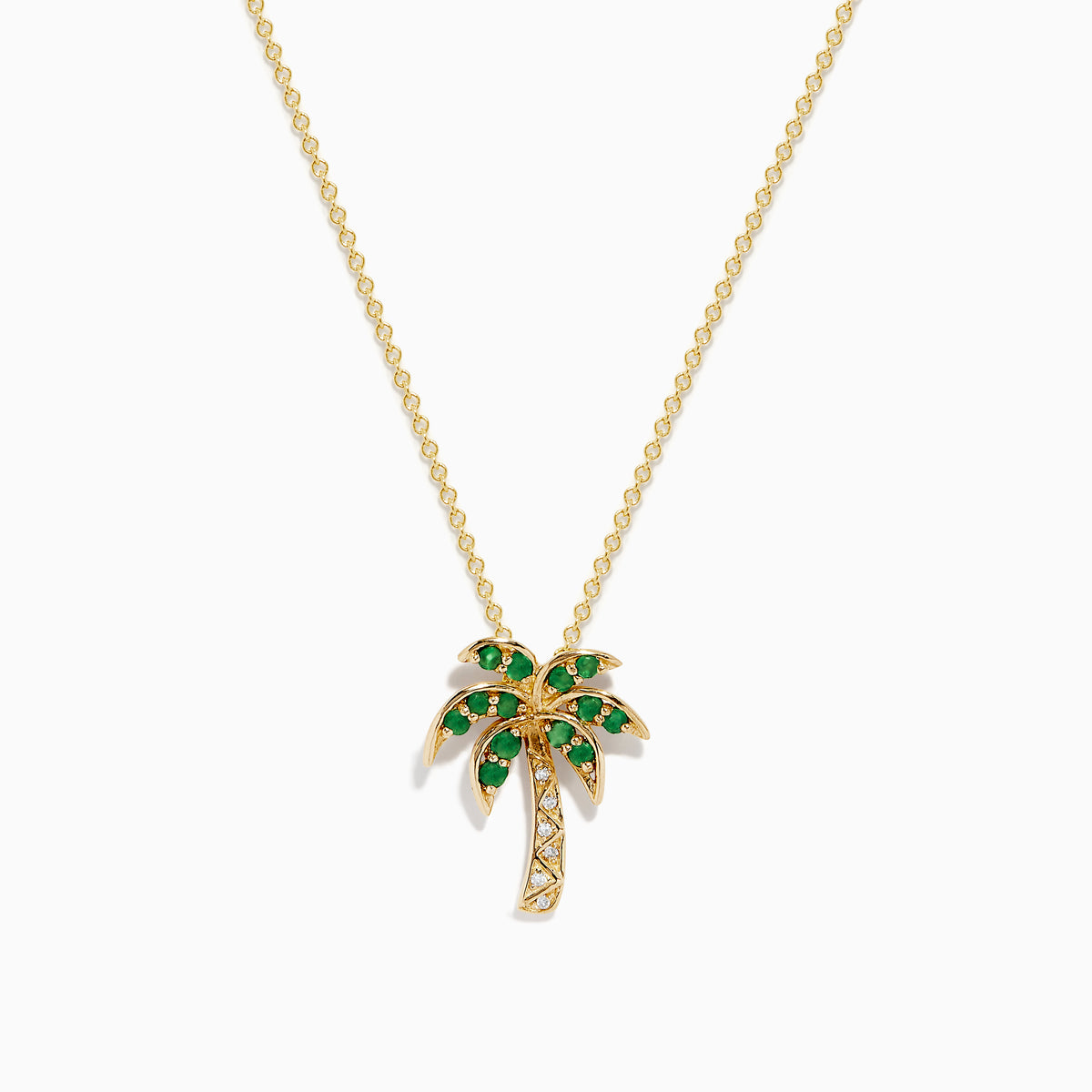The Novelty 14K Yellow Gold Emerald and Diamond Palm Tree Pendant features emerald gemstone leaves and diamond-accented trunk, displayed on a plain white background.