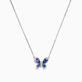 The Nahla Siri 14K White Gold Tanzanite and Diamond Butterfly Necklace (1.24 TCW) features a butterfly pendant with tanzanite-blue gemstone wings and diamond accents, shown against a white background.