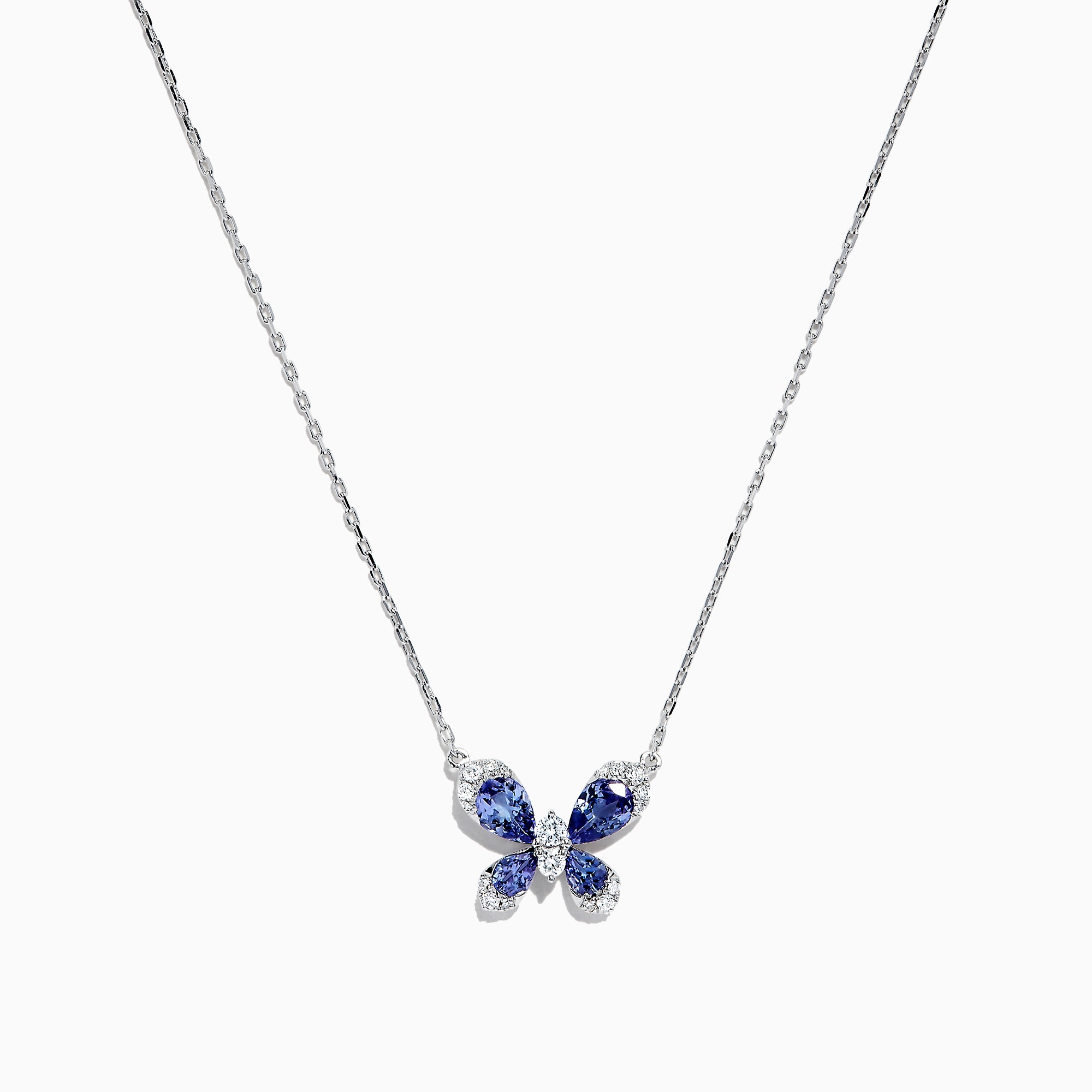 The Nahla Siri 14K White Gold Tanzanite and Diamond Butterfly Necklace (1.24 TCW) features a butterfly pendant with tanzanite-blue gemstone wings and diamond accents, shown against a white background.