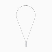 The Classique 14K White Gold Diamond Vertical Necklace, 0.61 TCW, showcases a sleek white gold chain and a vertical rectangular pendant adorned with a row of brilliant diamonds down the center.