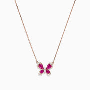 The Nature 14K Rose Gold Ruby and Diamond Butterfly Necklace, 1.62 TCW, from Effy features a butterfly-shaped pendant with rubies and diamonds on a delicate gold chain, displayed against a plain white background.
