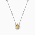 The Canare 18K Two-Tone Gold Yellow and White Diamond Necklace (0.69 TCW) features a teardrop pendant with a yellow gemstone encircled by white diamonds, set on a gold chain accented with spaced round gemstones.