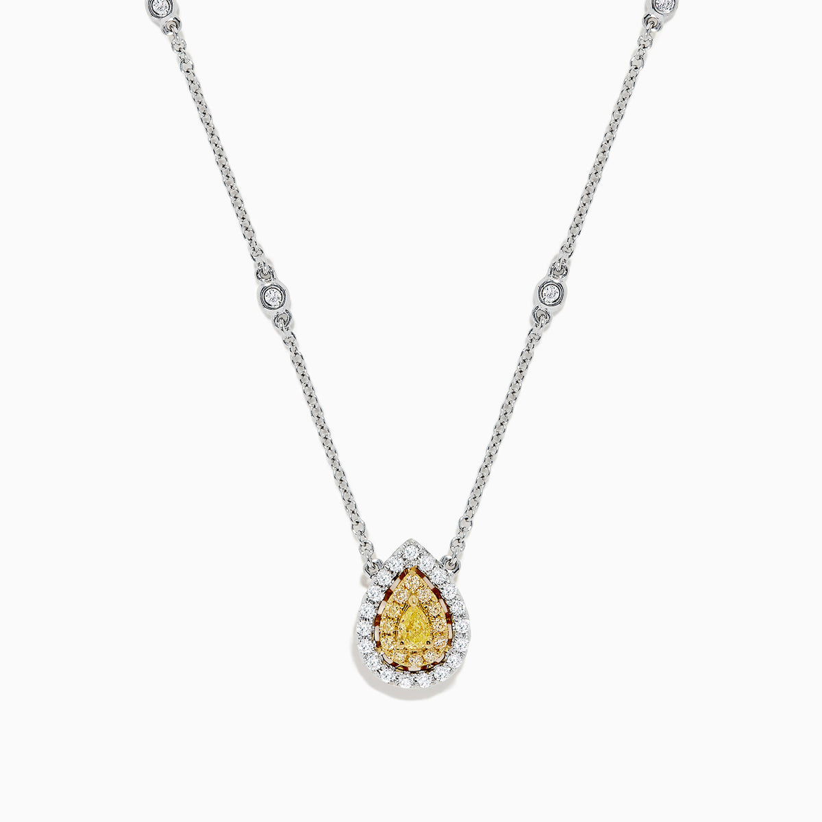 The Canare 18K Two-Tone Gold Yellow and White Diamond Necklace (0.69 TCW) features a teardrop pendant with a yellow gemstone encircled by white diamonds, set on a gold chain accented with spaced round gemstones.